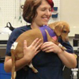 Sarah Blau holds puppy