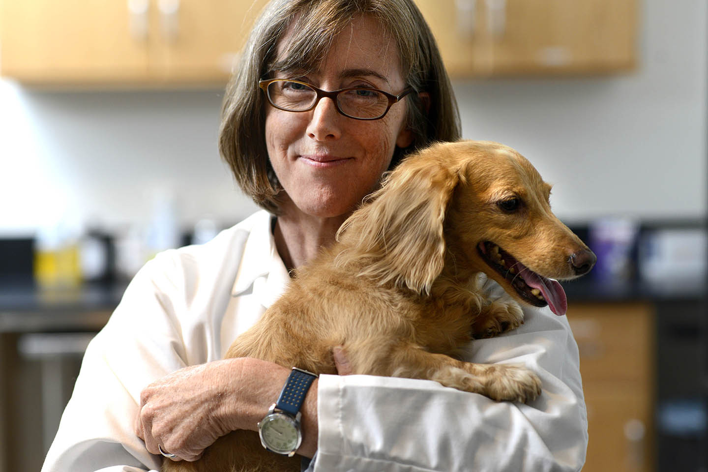 Dr. Natasha Olby holding dog
