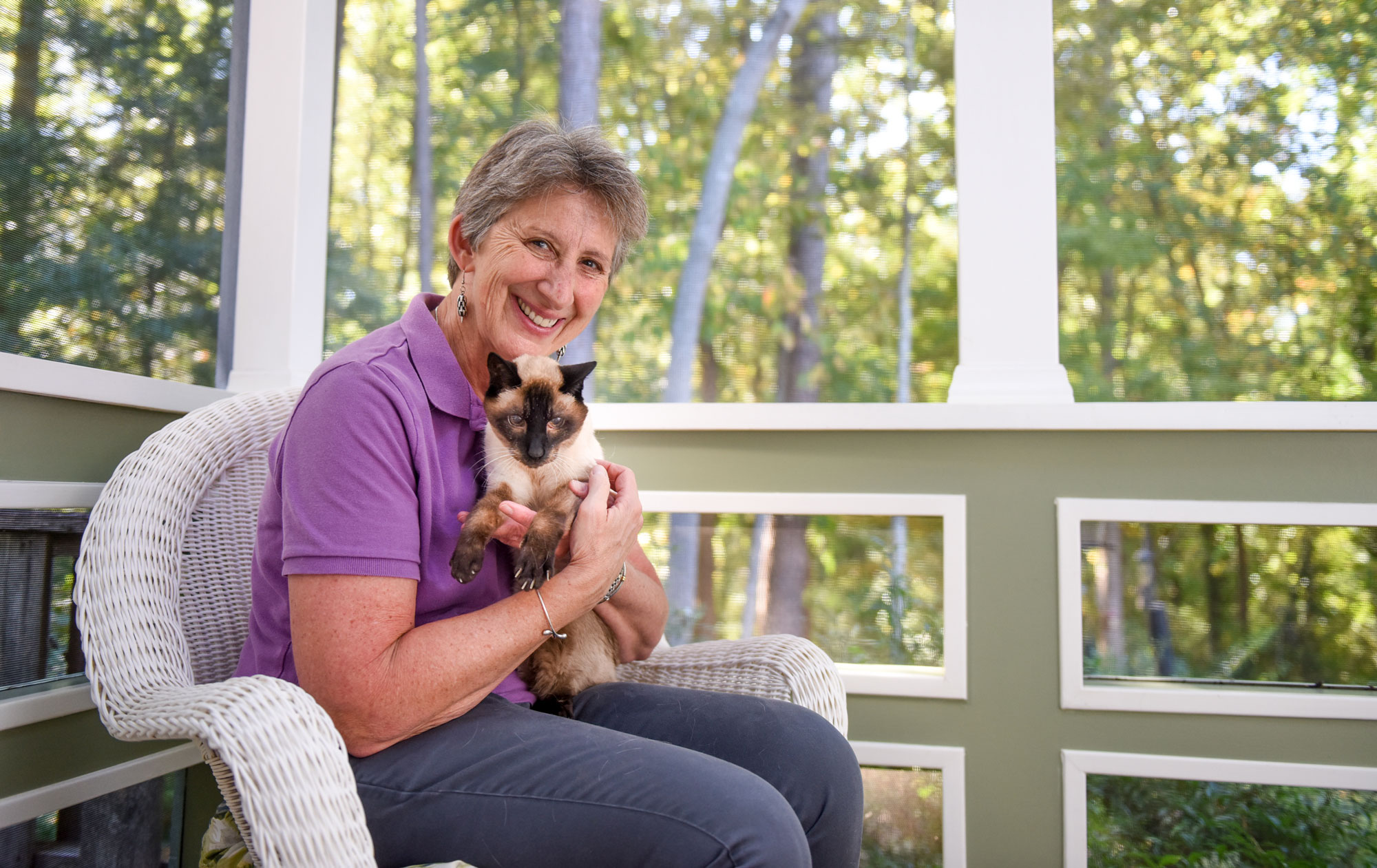 Dr. Kady Gjessing with her 22-year-old Siamese cat, Iva