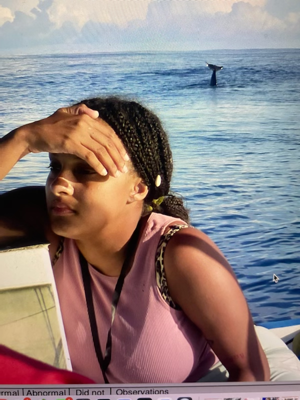 Attachment options… Chelsea Drumgoole, CVM Class of 2023, works on spotting whales during a trip to the Galapagos in March 2022.