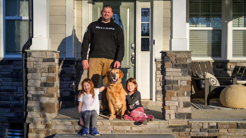 K9 Officer Matthew Berl with his daughters Darcy, left, and Erin and their new pet Nitro.