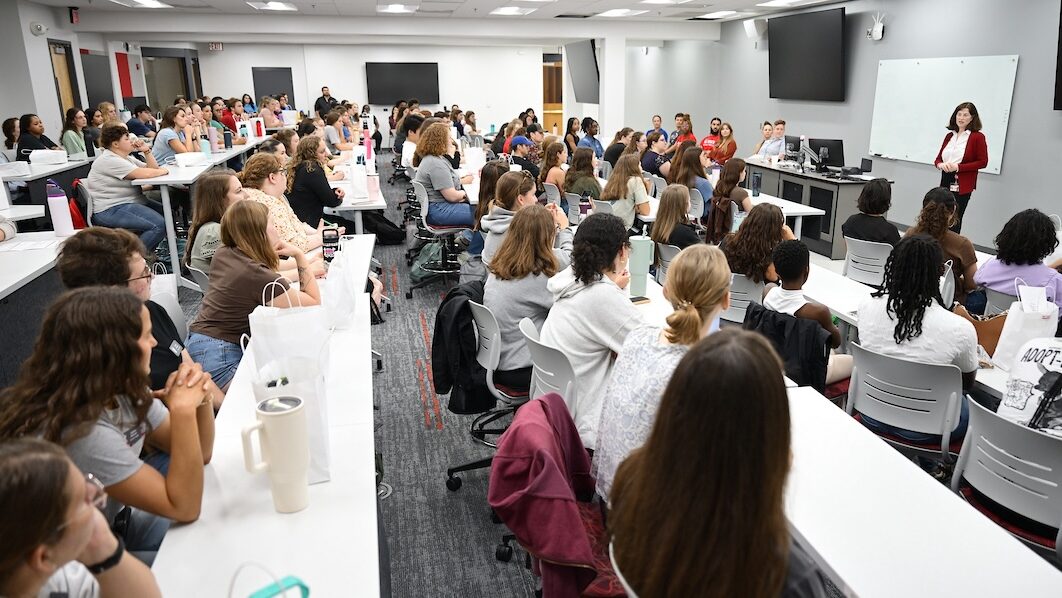 College of Veterinary Medicine Dean Kate Meurs speaks with the incoming class of veterinary students at orientation.