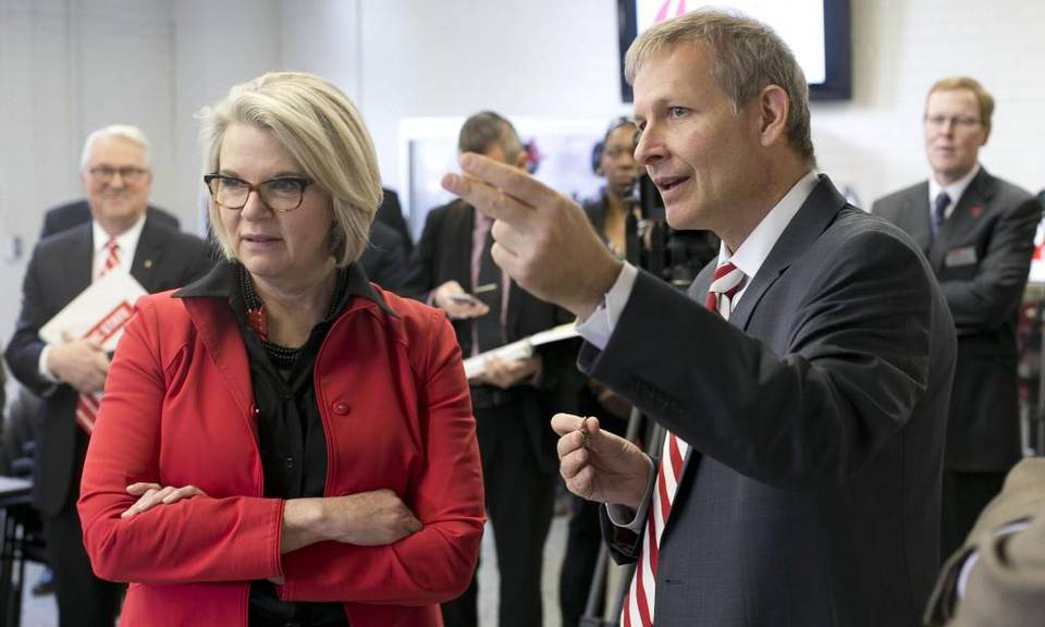 Dr. Denis Marcellin-Little with UNC President Margaret Spellings
