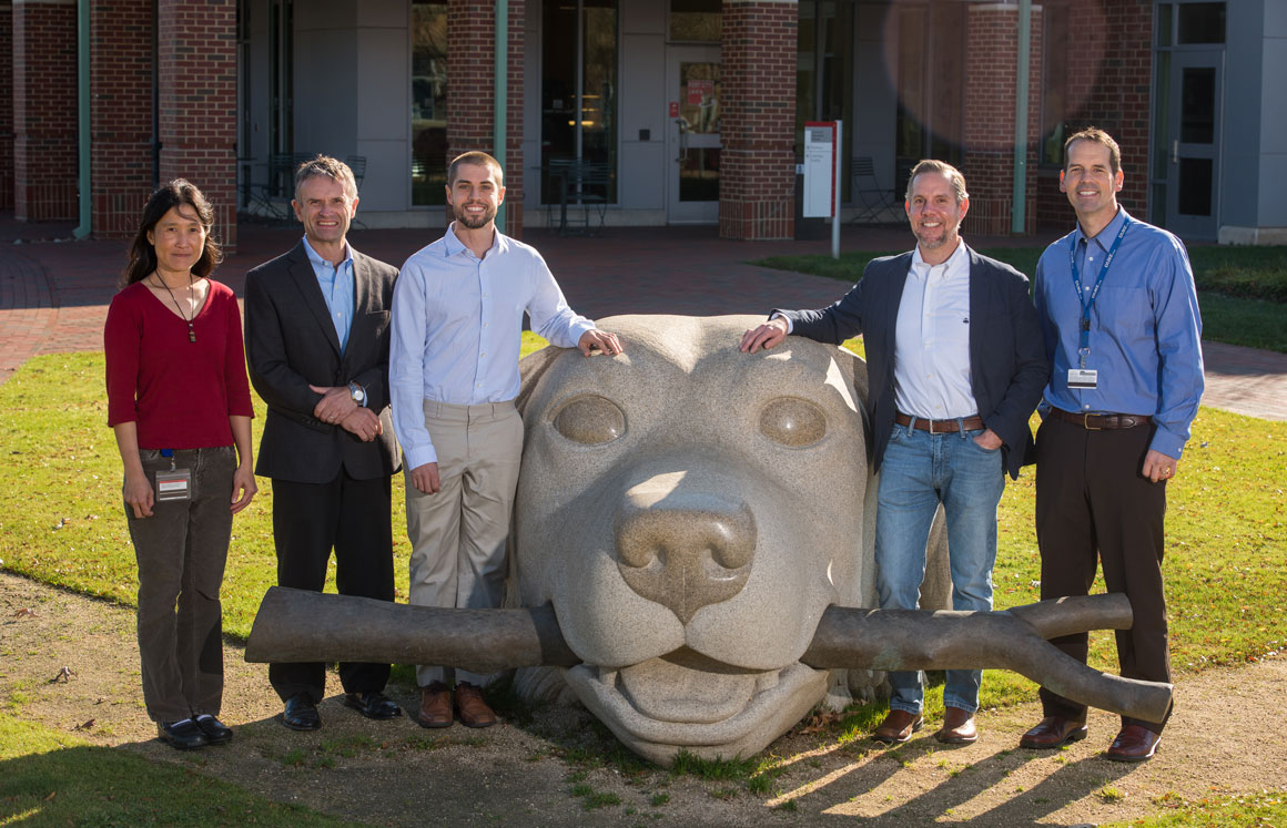 faculty post with dog statue